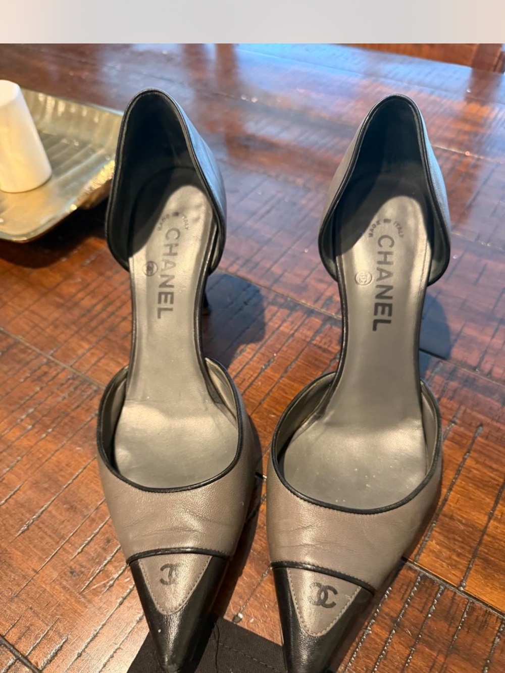 CHANEL Two-Tone Pointed Toe D'Orsay Pumps in Black and Taupe